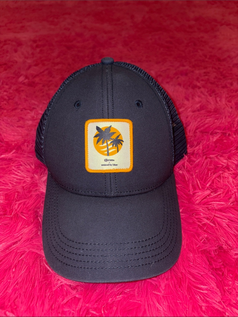 United By Blue Black Trucker Hat with Yellow Patch